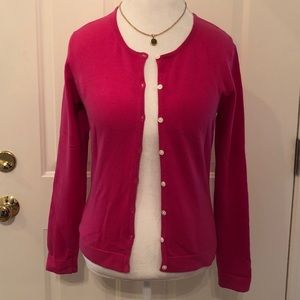 Harold’s hot pink button down cardigan